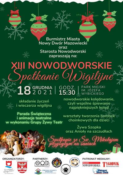 zielone tło, na górze zwisające bombki, pośrodku czerwony napis